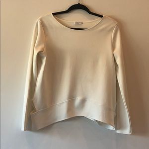 Off white cream top with rainbow cut on bottom